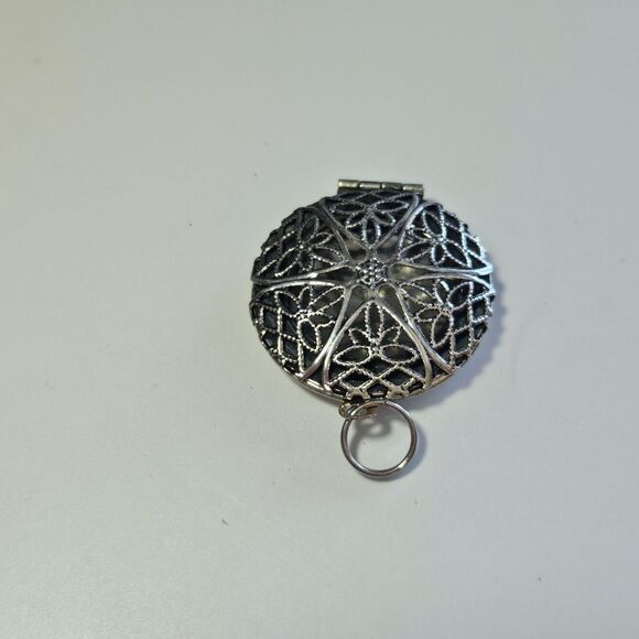 Silver tone round filigree locket - Picture 7 of 9